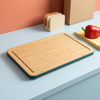 One board from the proposed set laid flat on a colorful kitchen preparation counter