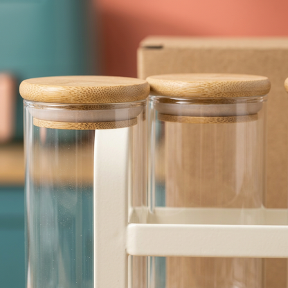 Close-up concept of natural-tone lid edge clear jar body and ivory rack rail