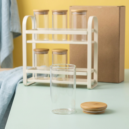 One open jar and removable lid with the other five jars on the rack behind