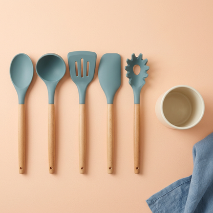 Overhead concept layout of spoon, ladle, slotted turner, spatula, pasta server and empty holder